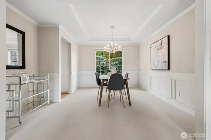 Generous formal dining room with extra space for more pieces and marvelous light fixture.