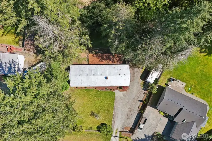 Expansive front lawn ideal for play or relaxation.