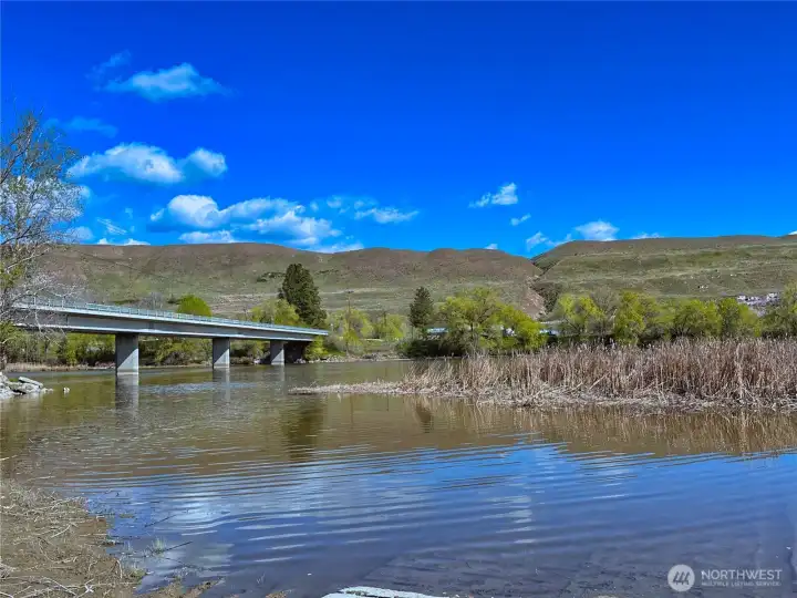 This 2.79-acre property in Okanogan County is ideally situated along the scenic Okanogan River and surrounded by public lands for endless recreation and privacy