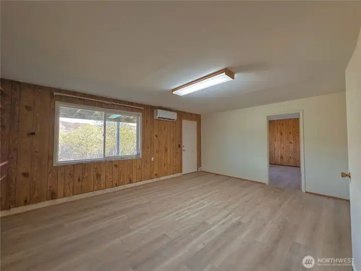 Lower-level family room space with exterior access could be a great MIL or apartment option