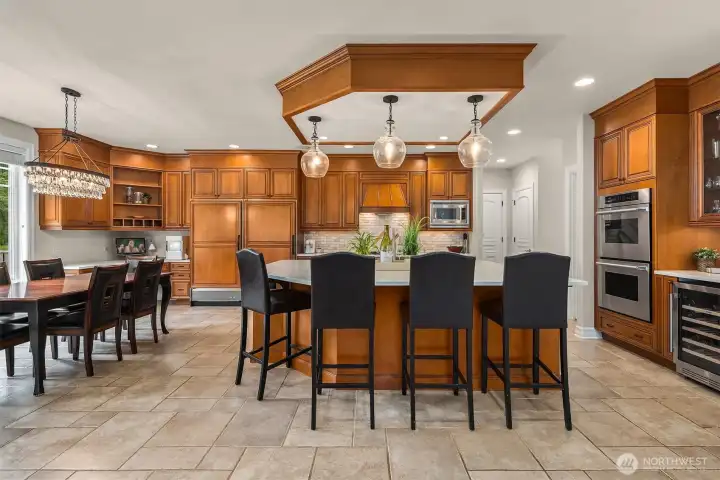 Breakfast bar seats a crowd, and room for a very large table as well~