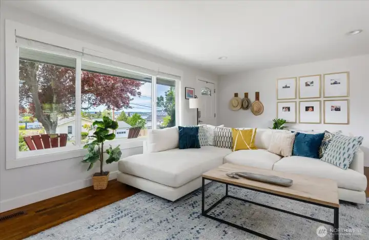 Large picture windows with views of Penn Cove