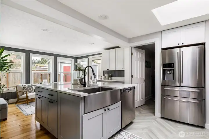 Windows and skylights make this very functional kitchen a dream to cook in and hang out.