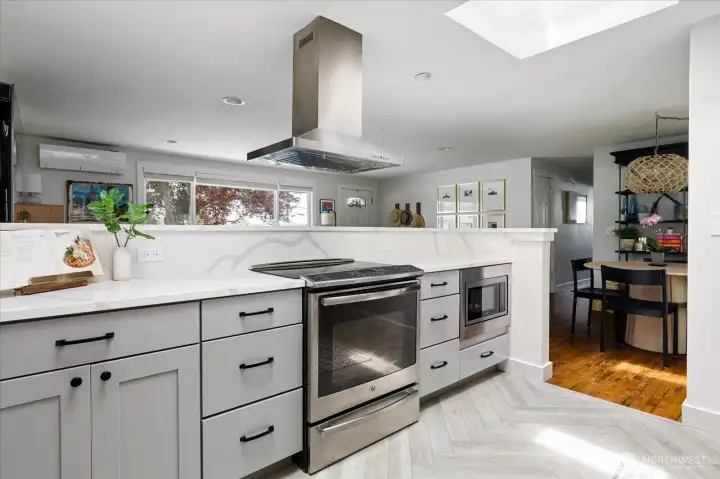 More counter space with views while you cook and visit with family in the living room