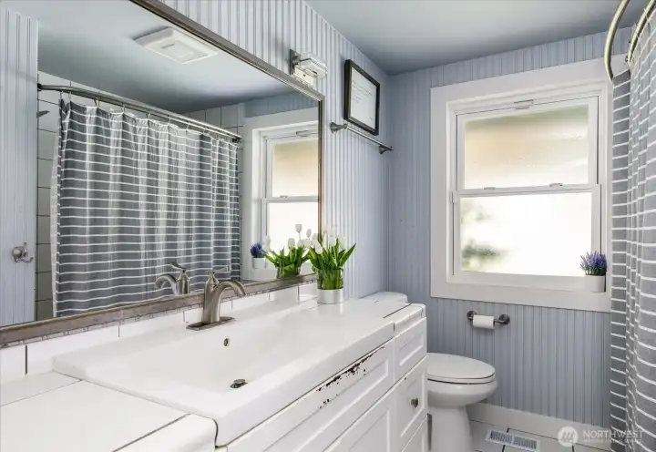 Charming full bath with a rustic cottage feel
