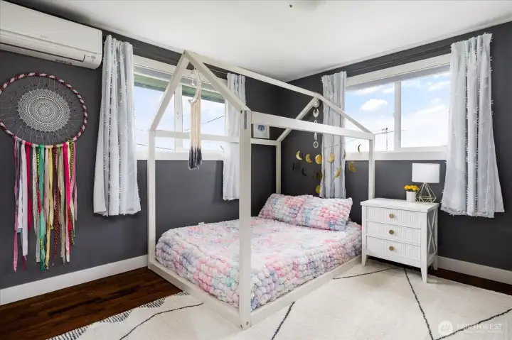 3rd bedroom with corner window taking in the water views