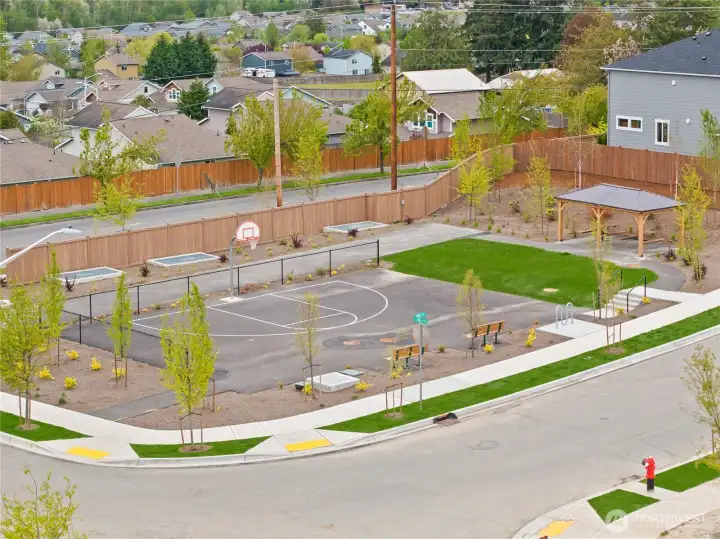 Bakerview's Sports Court (with benches and bike rack) and Picnic Shelter