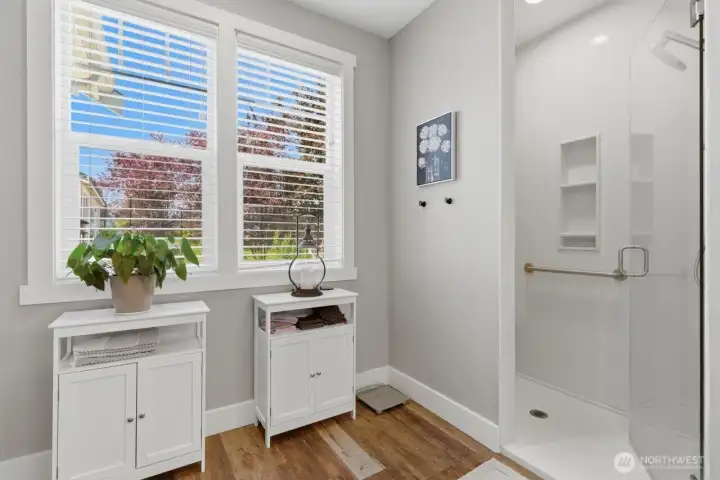 Low-entry, walk-in shower in the primary bathroom.