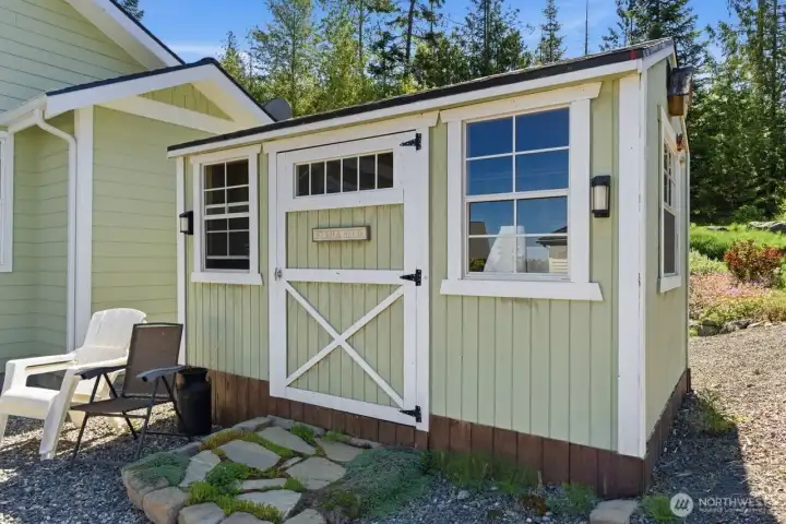 The gardening shed with natural stone and moss landing.