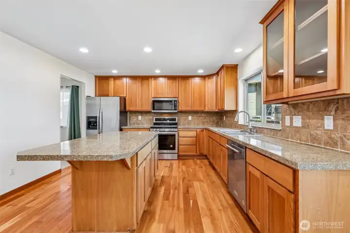 Kitchen with granite tile counters