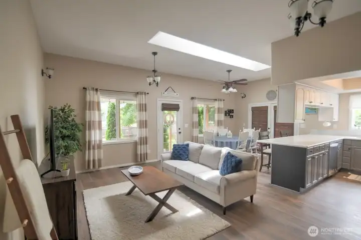 Inside? This great room! 10 foot ceilings with skylights open up the space. Inside? This great room! 10 foot ceilings with skylights open up the space.