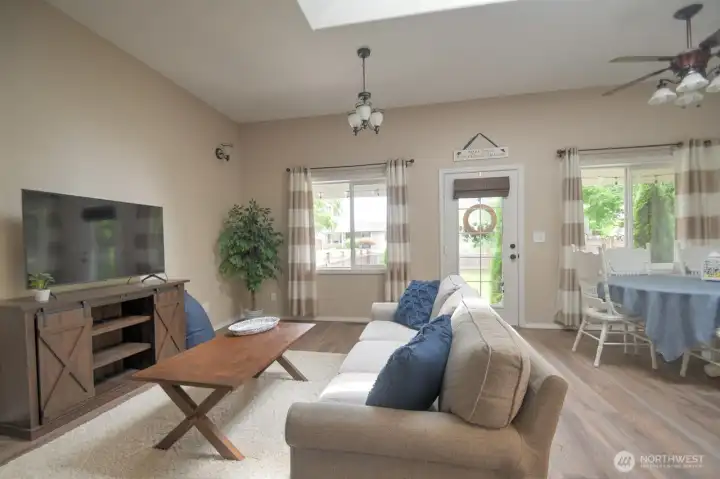 Living room, dining room & kitchen combine into a whole that's greater than the sum of their parts. Living room, dining room & kitchen combine into a whole that's greater than the sum of their parts.
