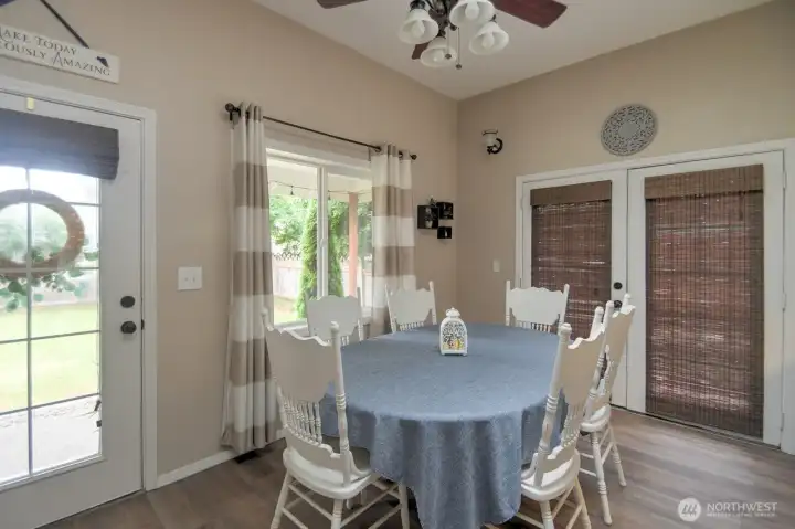 Dining space big enough for a party, with French doors to the deck. Dining space big enough for a party, with French doors to the deck.