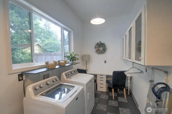 Off the living room, washer and dryer are close at hand! Space for a "drop zone" off the garage, shelving for pantry extras and Off the living room, washer and dryer are close at hand! Space for a "drop zone" off the garage, shelving for pantry extras and