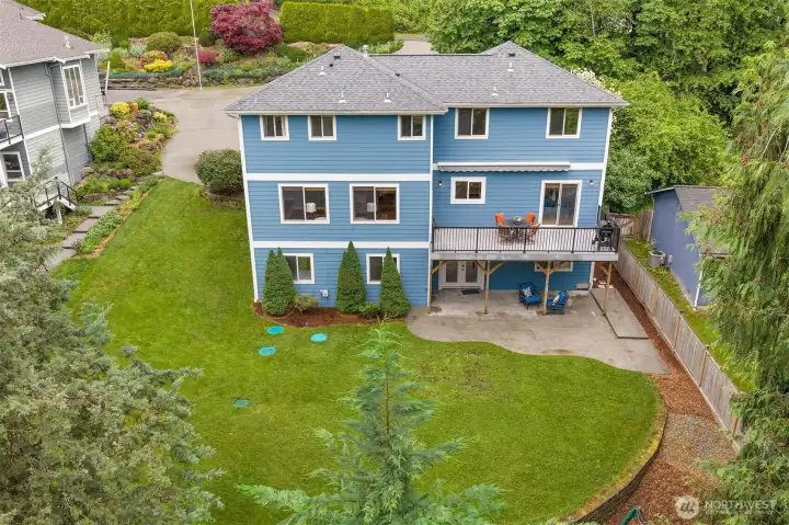 The home's multi-level outdoor spaces offer plenty of room to play, relax, and entertain. The home's multi-level outdoor spaces offer plenty of room to play, relax, and entertain.