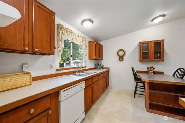 Lots of cupboards in this kitchen