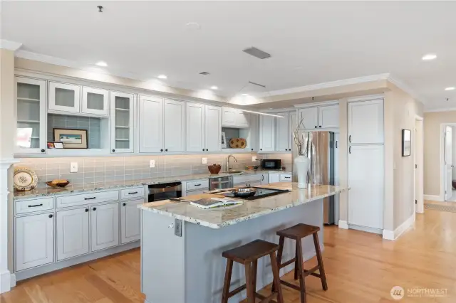 Fabulous kitchen renovated to perfection with an island where you can sit and talk with the chef!