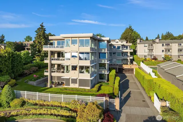Come home to the premier Lake Pointe boutique building, crafted by a builder for his own residence.