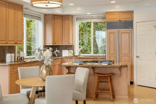 Wonderful, social layout with bar seating in addition to the dining nook.