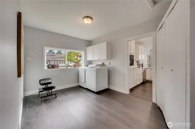 Extra large laundry / Utility room offer you space to create a custom office/ craft room