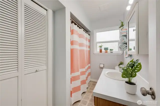 Full bath with spacious bi-fold closet offers storage all your towels, shampoo & TP