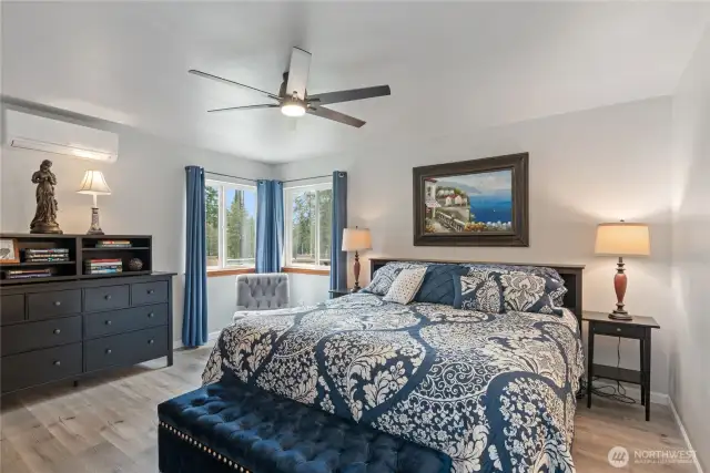 The primary bedroom is on the main floor, just off of the family room. This makes easy-living and aging-in-place a breeze here!