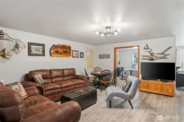 Downstairs, you'll find the large rec room/family room. It's so spacious down here that you have many different possibilities for living arrangements.