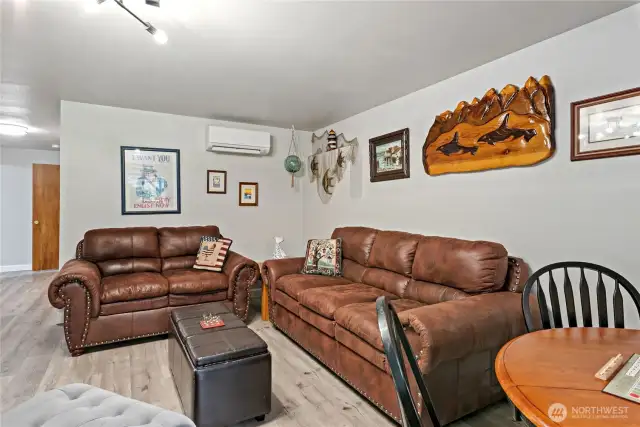 Tall ceilings and lots of light make this large area feel even more spacious!