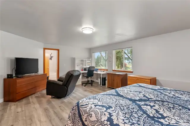 The 2nd bedroom has room for a desk and sitting area and a Jack-and-Jill entrance to the bathroom