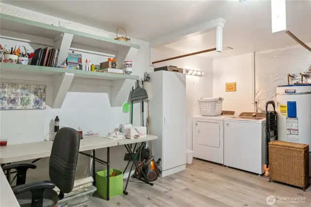 The huge laundry room doubles as a craft/hobby room. There is loads of storage here that isn't shown in the photo.