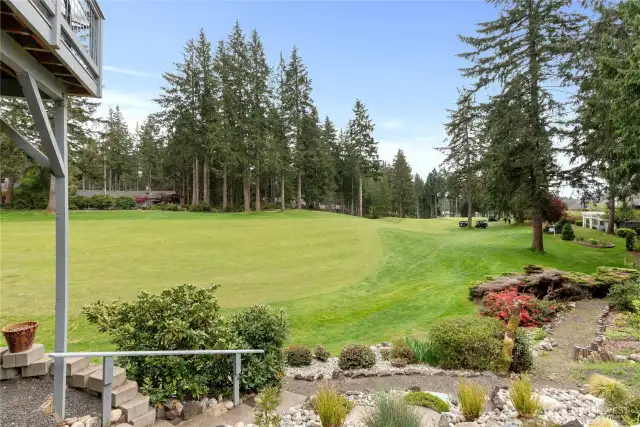 And wow! Look at how this landscaping blends in perfectly to the golf course.
