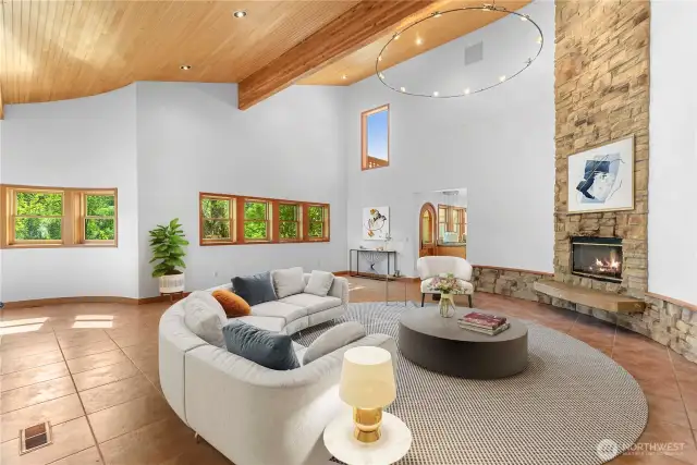 Vaulted ceilings in great room, dual sided fireplace.