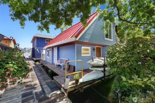 Stylish floating home with two bedrooms, two bathrooms, and a stunning roof top deck is just the beginning.