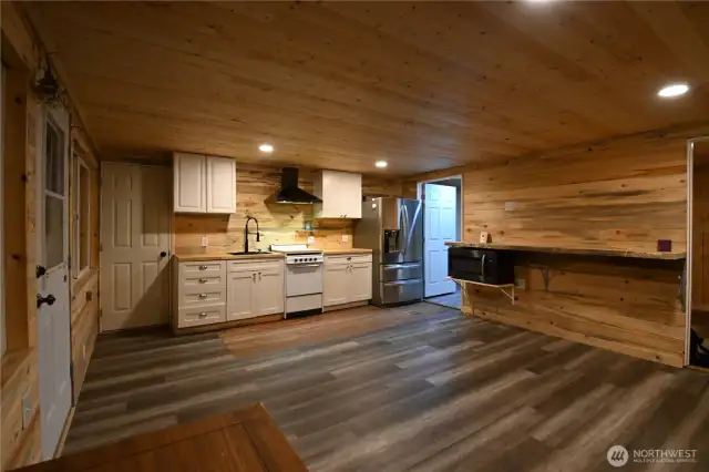Open concept ~ live edge bar for entertaining or casual gatherings.