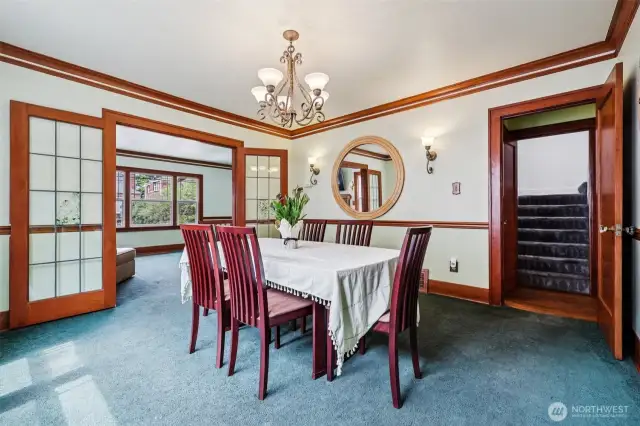 Large dining room to delight your guests.  Wood floors under carpeting.