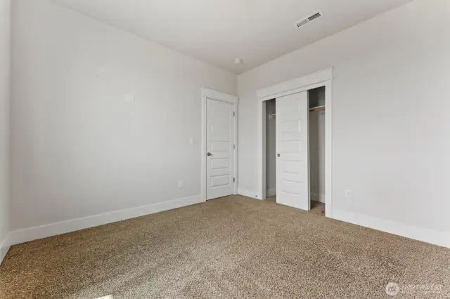 3rd bedroom facing backyard