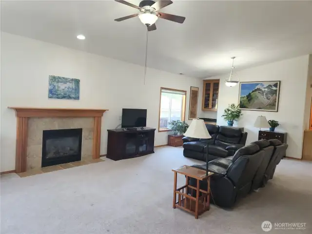 Walk into your great room with plenty of space for living room and dining room furniture.  Stay warm & cozy by the gas fireplace.