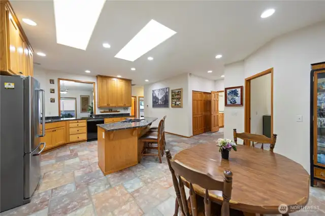 This angle shows one of the large pantry closets and entrance to the laundry room.