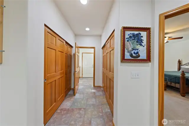 From the kitchen, huge double pantry closets lead to the laundry/utility room.