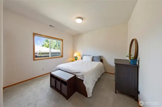 On the left side of the home are bedrooms 2 & 3.  Nice size with generous closet space.