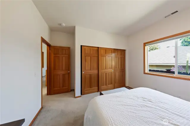 Bedroom #2 with large closet space. Beautiful wooden doors throughout the home.