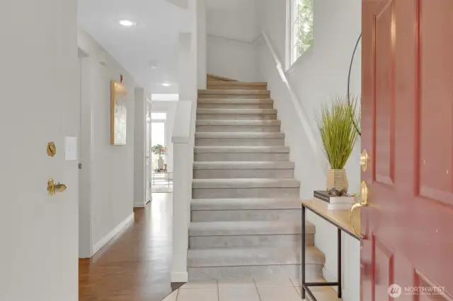 Entry stairs to bdrms, hall towards living rm