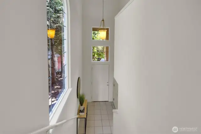 Stairs from upper level towards entry
