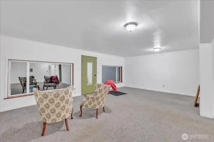 Daylight basement with door to back patio.