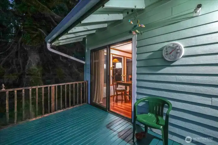 Deck off of side slider/dining area.