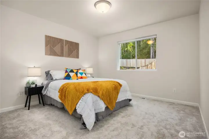 The upper level also features 3 spacious bedrooms.