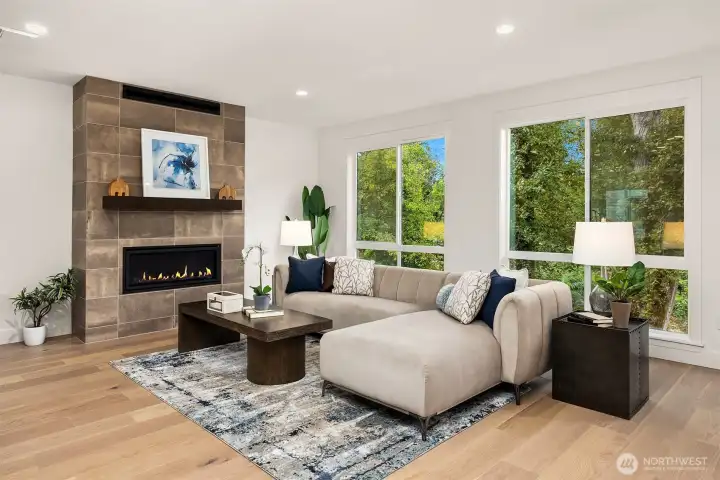 You'll love the floor to ceiling windows and the gas fireplace with full height tile