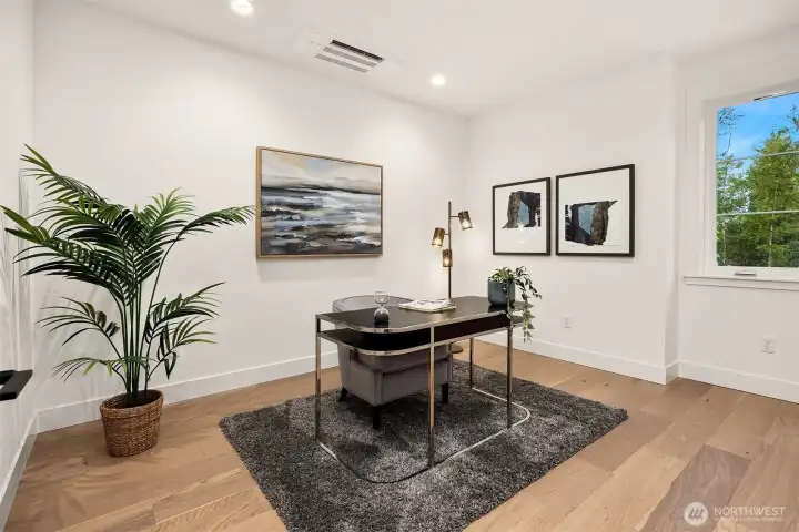 Large office, play room, exercise room on the main floor
