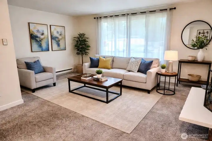 Downstairs unit, virtually staged. Photos taken prior to current tenant occupying unit.