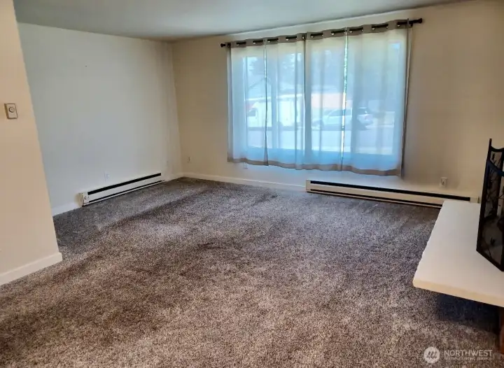 Downstairs unit. Photos taken prior to current tenant occupying unit.